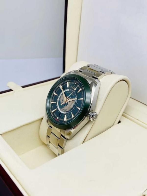 Omegg_a Seamaster Aqua Terra World Time with a green dial