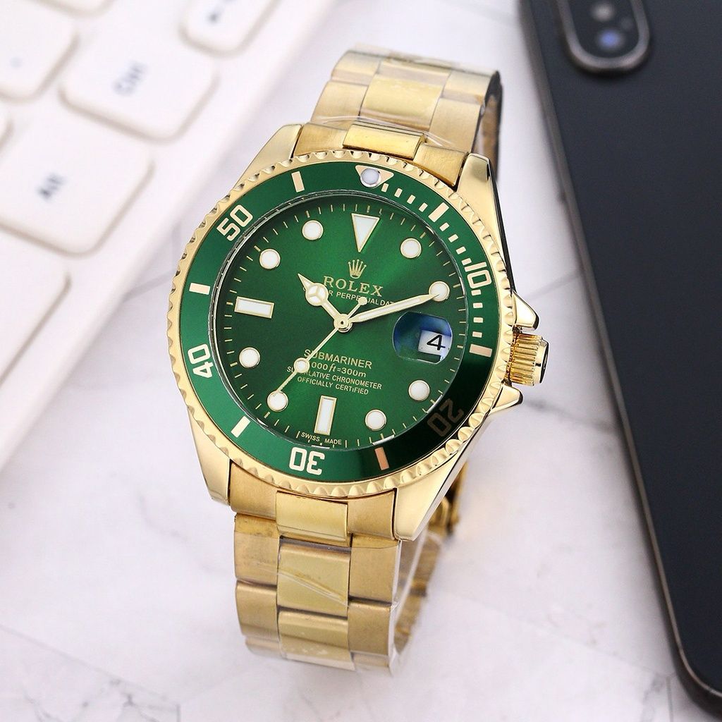ROL.EX SUBMARINER GOLD WITH GREEN DIAL